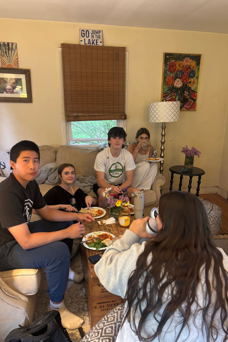 International students gather in a welcoming home environment, demonstrating belonging, host family support, community connection, student well-being, and a reliable support system while studying abroad in the United States.